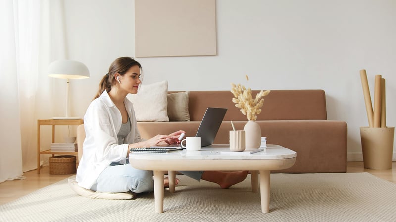 Woman learning online at home on her laptop Woman learning online at home on her laptop