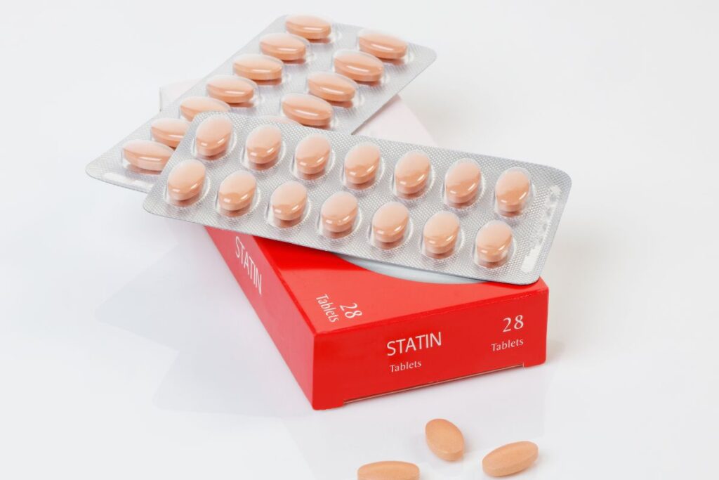 box of medicine with statin written truth about cholesterol