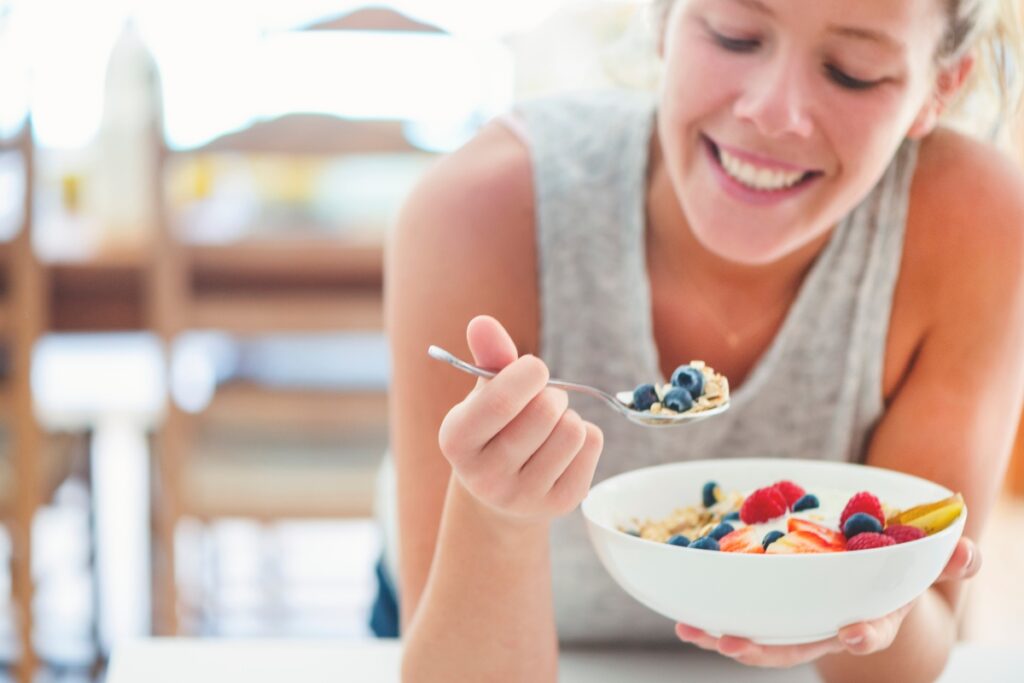 woman intuitively eating healthy meal