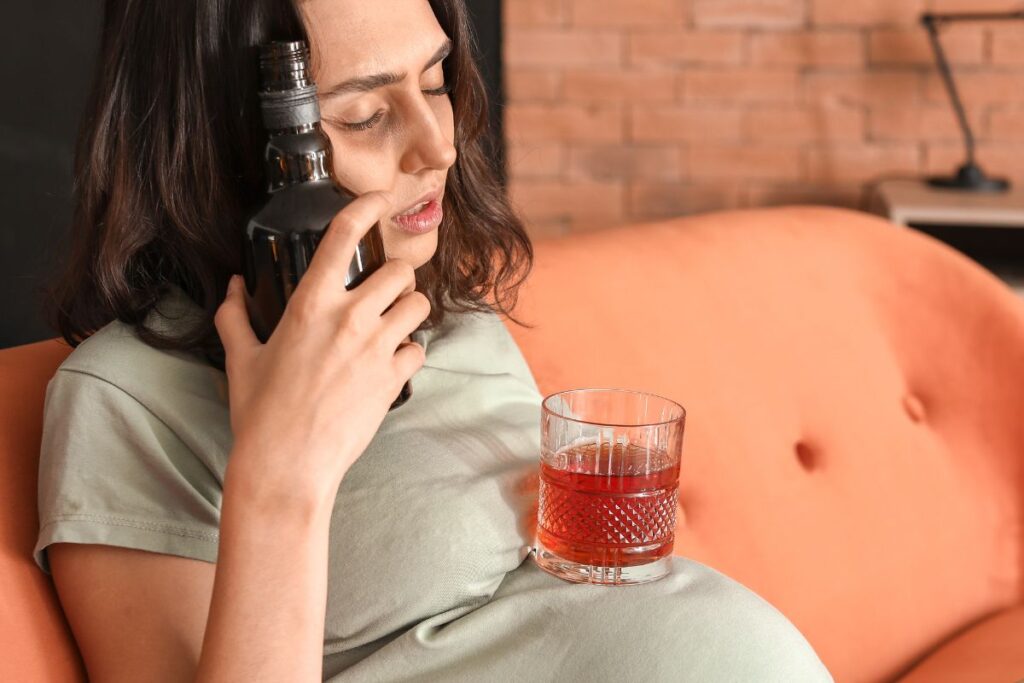 woman getting unhealthy due to over drinking - calories in alcohol 