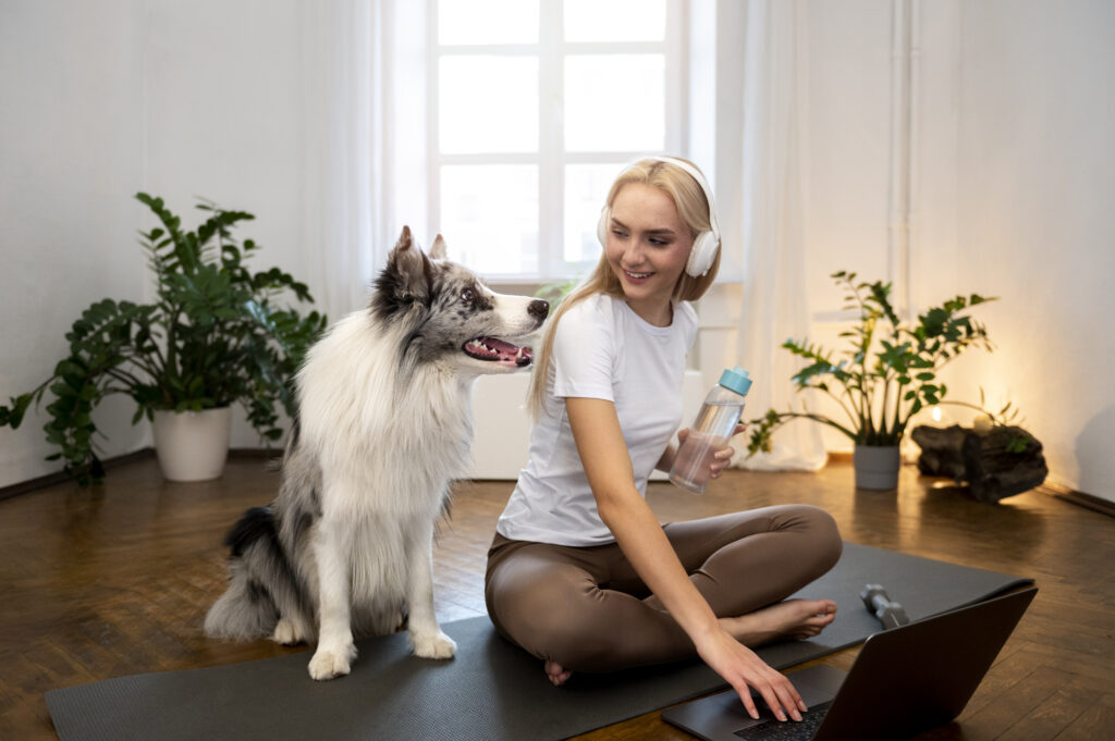 corporate employee enjoying lofe at home playing with pets or kids